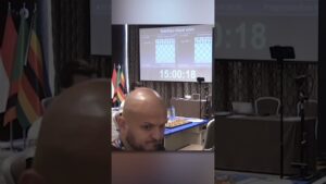 Magnus Carlsen Offers a Handshake to an Invisible Person
